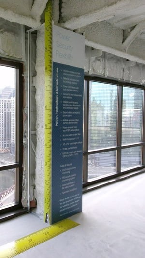 COLUMN AND FLOOR GRAPHIC AT LEASING CENTER