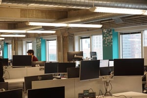 WIDE VIEW OF COLUMN GRAPHICS FROM OPPOSITE SIDE OF OFFICE