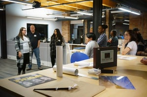 Julia Erik and Catie Bring Students Through Sales Office Side