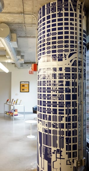 Pillar-Graphic-With-Framed-Print-in-Background