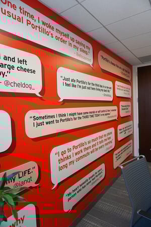 VERTICAL IMAGE OF PORTILLO'S WALL GRAPHICS AND TWEETS