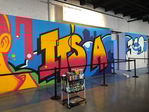 A graffiti wall with the word lisa painted on it