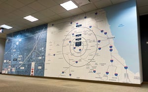 Mural on an office wall featuring an enlarged map of Chicago