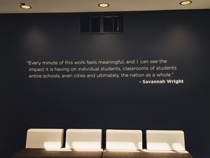 Vinyl lettering displays an inspirational quote in an office lobby that