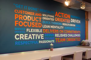 Vinyl letters compose an inspirational message on Scout's breakroom wall.