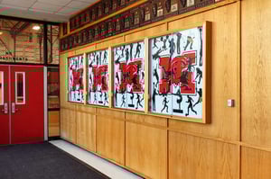 Niles West high school framed graphics outside of gymnasium