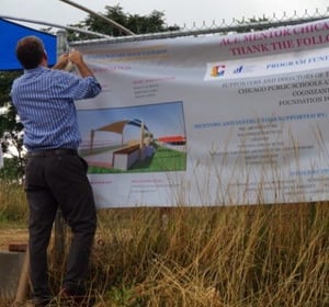 ACE-Sponsor-Banners-Being-Fastened-768x511